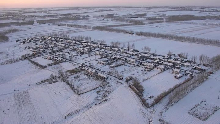 这是1月18日拍摄的黑龙江绥化市望奎县惠七镇李景华屯（无人机照片）。（张涛 摄）