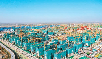 　　图为河北雄安新区容东片区安置房项目建设现场。