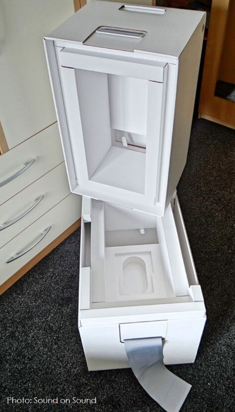 下面是苹果专利图7，展示了一个可用于包装的模范手把补偿机制的详细视图。