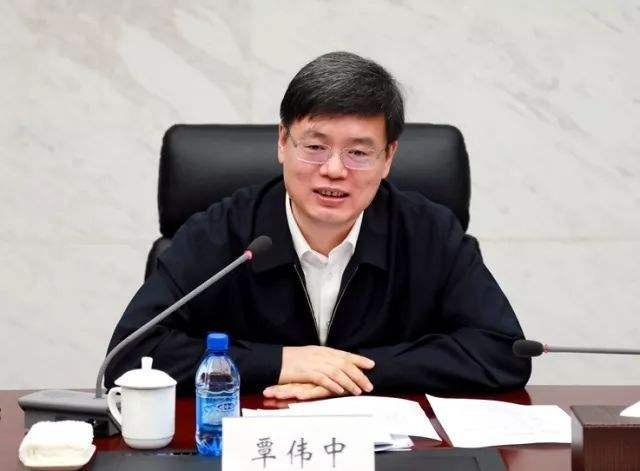  覃伟中（资料图）