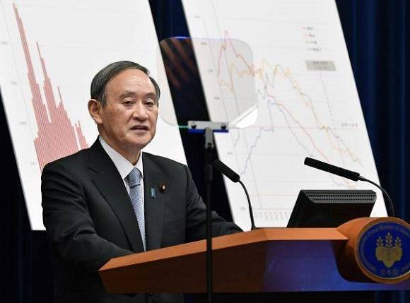  （图片说明：3月18日，日本首相菅义伟在东京首相官邸的记者会上发言。新华社/共同社）