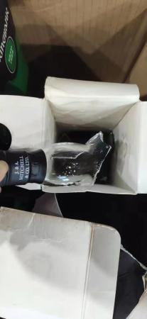 快递送达后拆箱发现酒瓶已破损。受访者供图