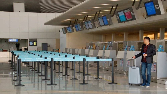 图：箱子能否登机关键看地勤　摄影：拉上窗帘