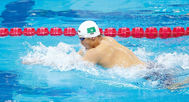 第十四届全国学生运动会大学组男子蛙泳100米，中国澳门选手出战。 （图片来源：视觉中国）