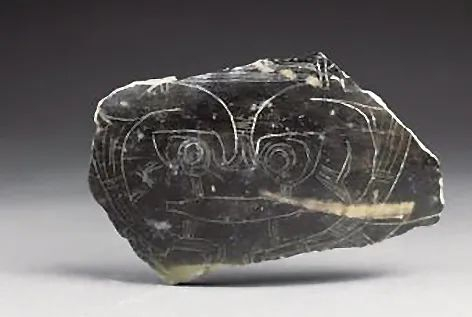 ▲良渚古城出土兽面纹陶器