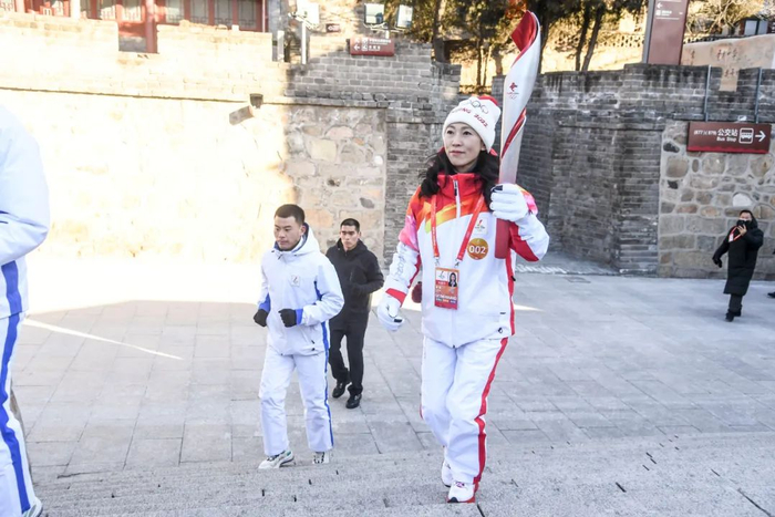 火炬手庞清在火炬传递中（摄影/任超）