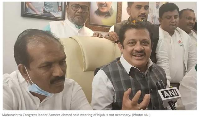 扎米尔·艾哈迈德（中）（报道截图）