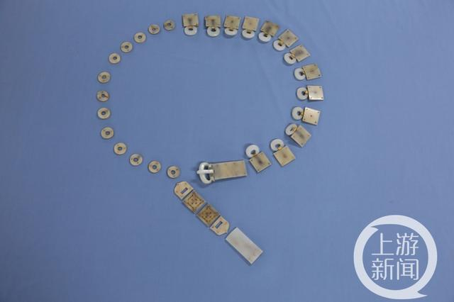 ▲金镶玉十三环蹀躞带，是证实隋炀帝杨广身份的重要物证。图片来源/扬州博物馆