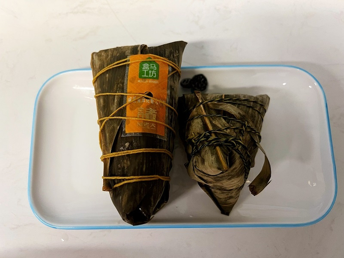 盒马工坊原来每只130克的肉粽增为200克