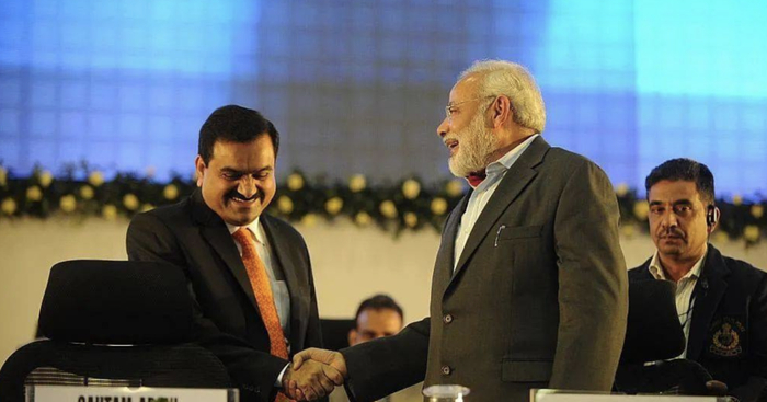 　·阿达尼（左）与莫迪。