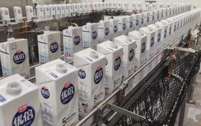 光明乳业生产线。  企业供图