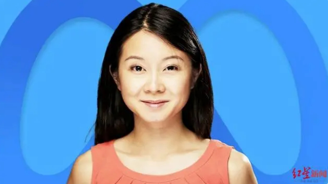 李苏珊在照片中微笑，背景是Meta公司的标识 图片来源：红星新闻