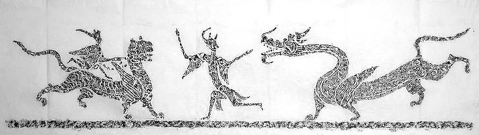 ▲汉画像石中的龙（右）虎（左）形象。（中国民族博物馆藏）