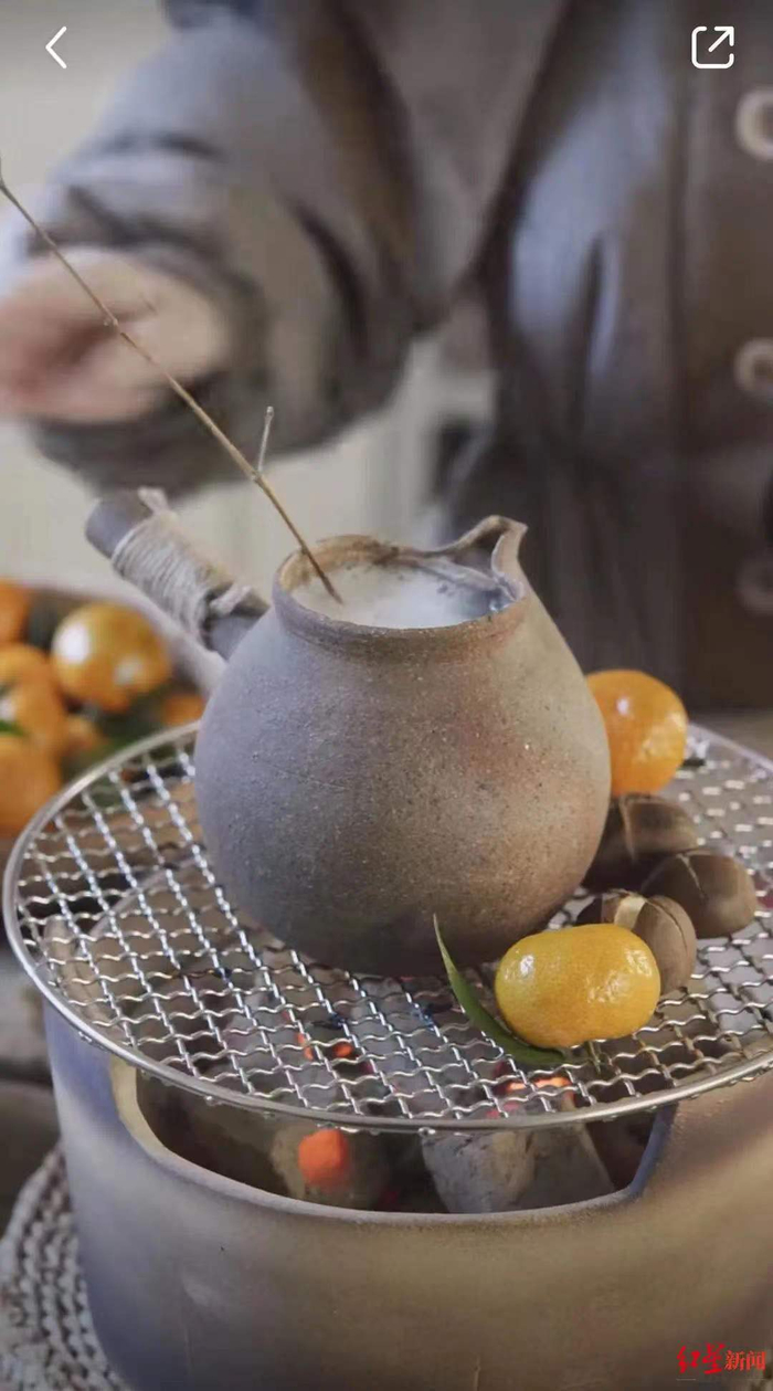 洛阳一对夫妇用土陶罐在家围炉煮茶