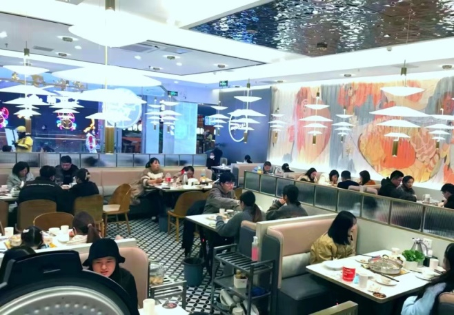 黄记煌北京一餐厅新年用餐景象。（图片由受访企业提供）