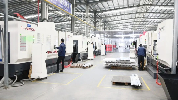 △肇庆铭达利科技有限公司车间内工人紧张有序生产中。图源 肇庆高新发布