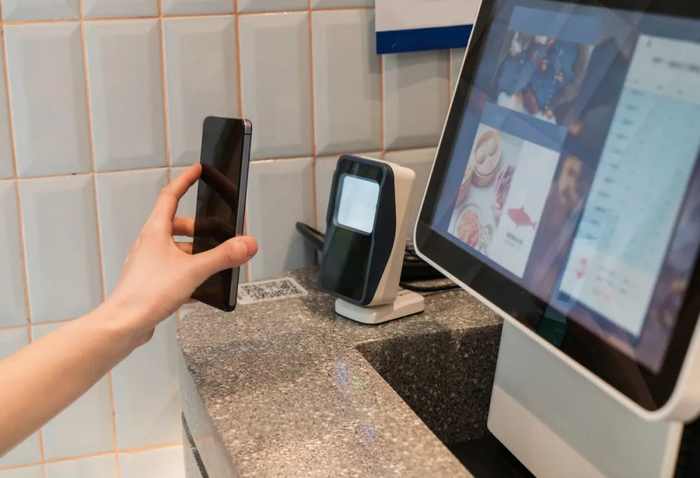 下馆子扫码支付已成趋势。图/图虫创意