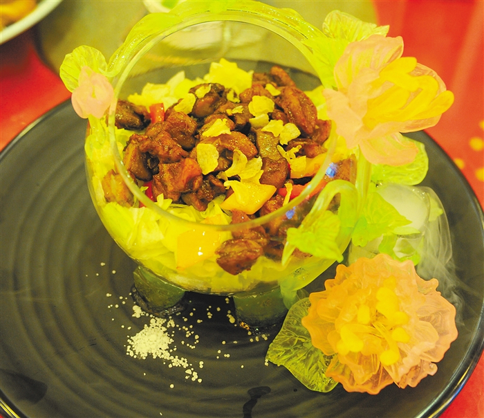 琼菜尖椒沙油螺。资料图