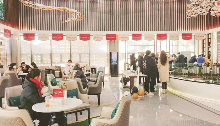         楼盘客户到访量持续提升。 石慧 摄