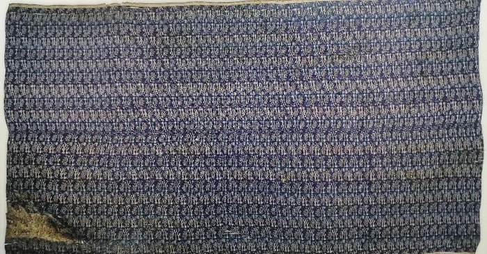 ▲尼雅墓出土的汉晋时期的锦衾。