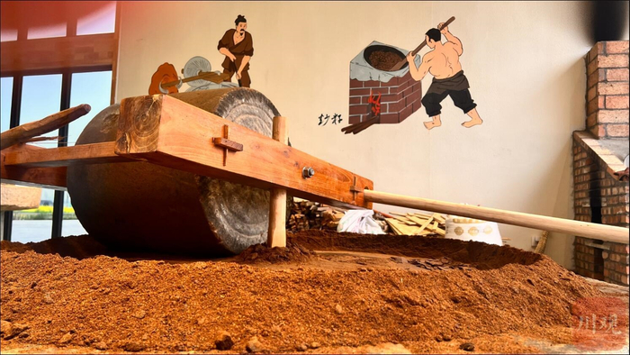 旌耘五星油坊里的木质古法榨油体验区。曹凘源 摄