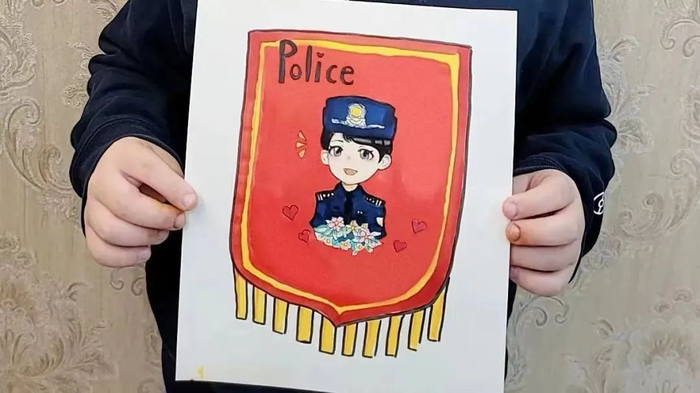 （孩子为双鹏绘制的“锦旗”）