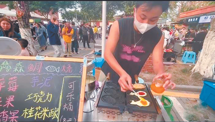     摊主忙得不可开交