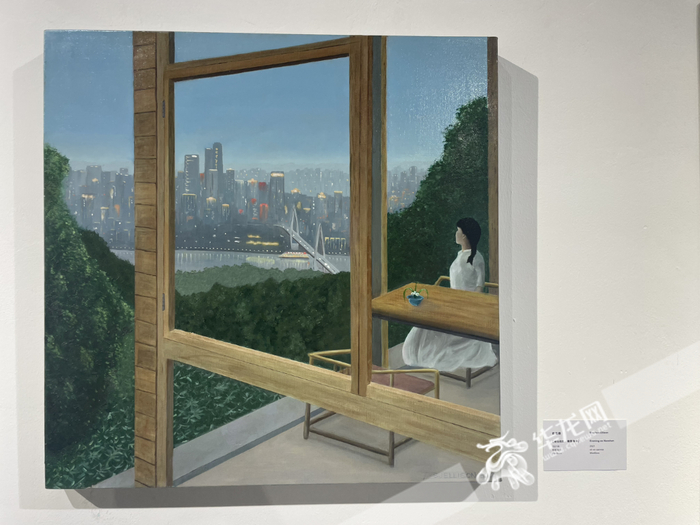史云森油画作品中，描绘的是从南山北望渝中半岛。华龙网-新重庆客户端 首席记者 王玮 摄