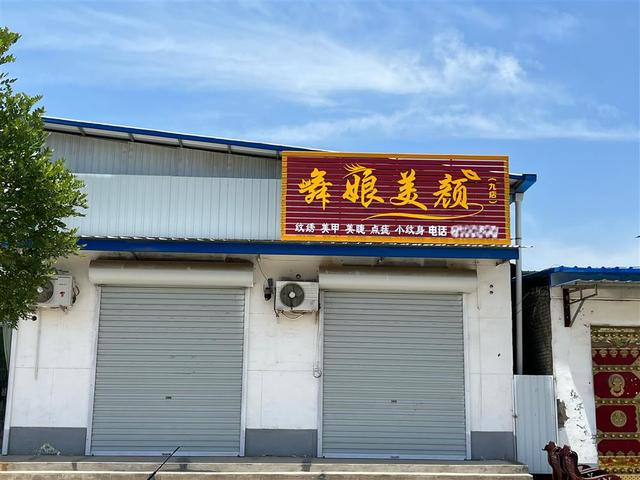 谢某多租下的门面房就在侨侨学校的对面。 王倩 摄