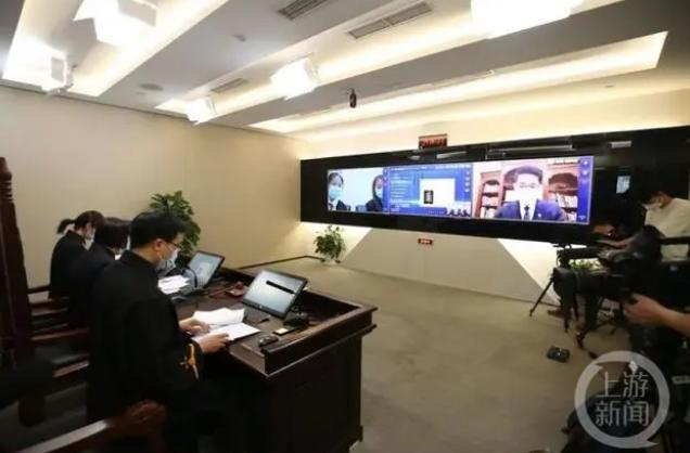 ▲爱奇艺“付费超前点播”被诉庭审现场。图片来源/北京互联网法院