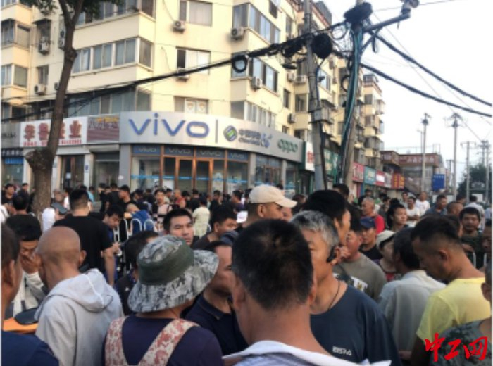 马驹桥中找零活的人。中工网记者 朱洁英 摄