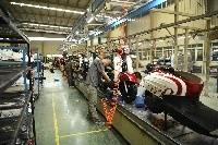 广安高新区摩托车生产车间（邻水融媒中心 供图）