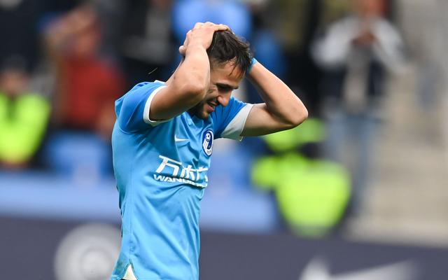 特索涅夫罚丢关键点球，抱头懊恼。  图/IC photo