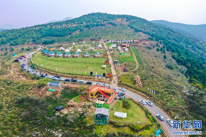 “皖北川藏线”（龙脊天路）带动周边旅游发展。新华网发（梅月摄）  