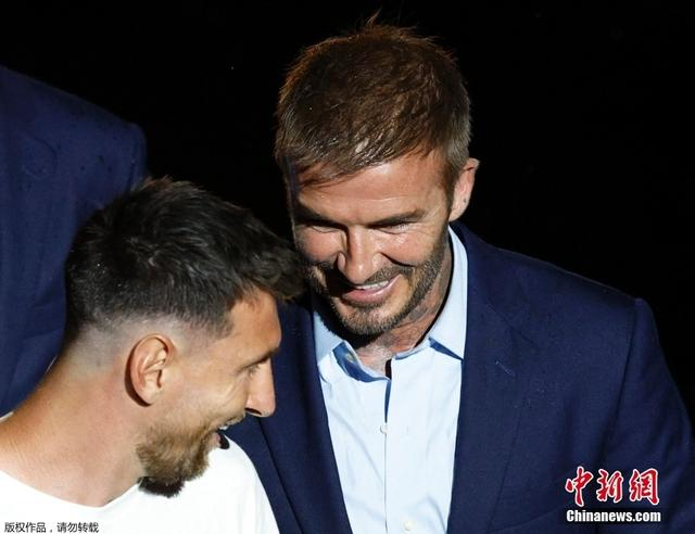 图为贝克汉姆与梅西
