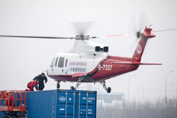 中国通航飞机正在执行空中业务。（中国通航供图）