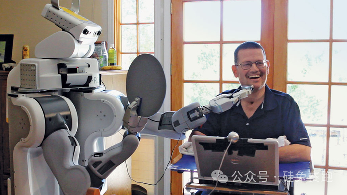 Henry Evans和PR2，图源 | Stanford Magazine