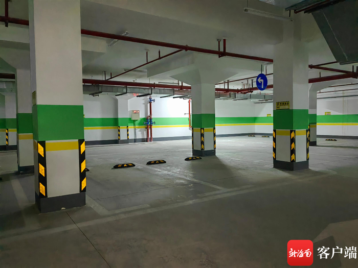 扬江花园一期地库没有一个车位安装充电桩。记者 李文韬 摄