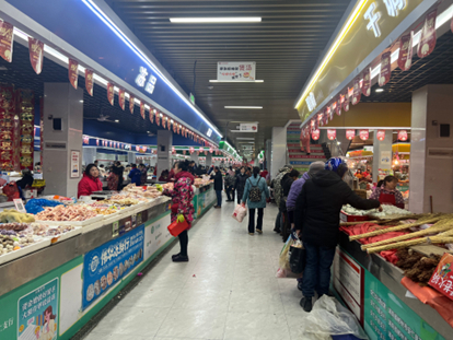 （图为安仁县红太阳农贸市场 本报记者段芳媛 摄）