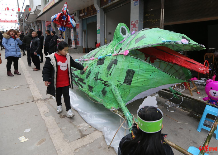 ▲南充“蛴蟆节” 资料图