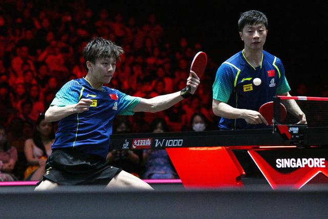 3月16日，林高远（左）/马龙在比赛中。新华社发（邓智炜摄）