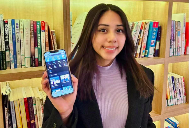 （图 | 萨尔瓦多女孩詹妮弗推荐来华朋友用支付宝）