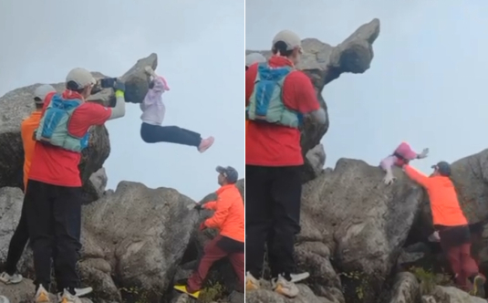 游客拍照不慎滑倒。图源：社交媒体截图