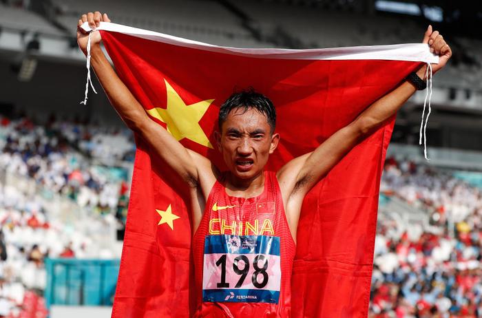 　　2018年第18届亚运会田径男子马拉松赛中，中国选手多布杰获得季军。新华社记者 王丽莉 摄