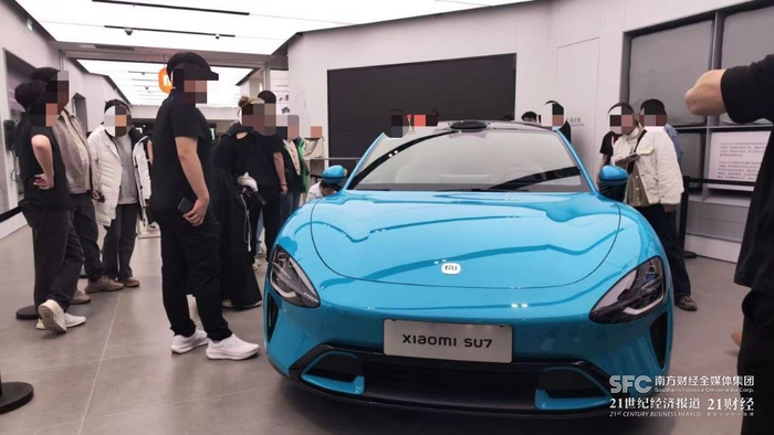 （小米之家北京市朝阳区合生汇汽车体验店 图片来源：21世纪经济报道）