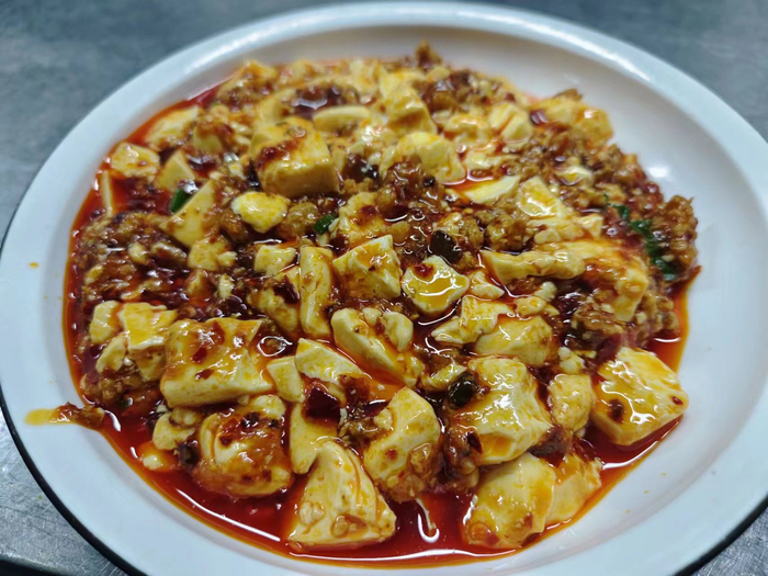 麻婆豆腐丝滑香嫩。劳动报记者陆燕婷 摄影