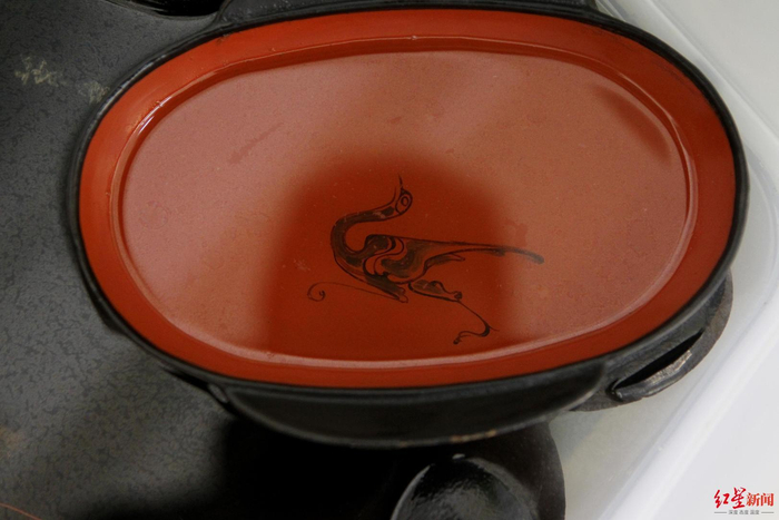 成都天回老官山汉墓出土的漆器（鲍泰良摄）