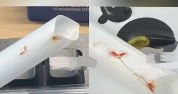 视频显示，该吸管上有一些红色的物质。