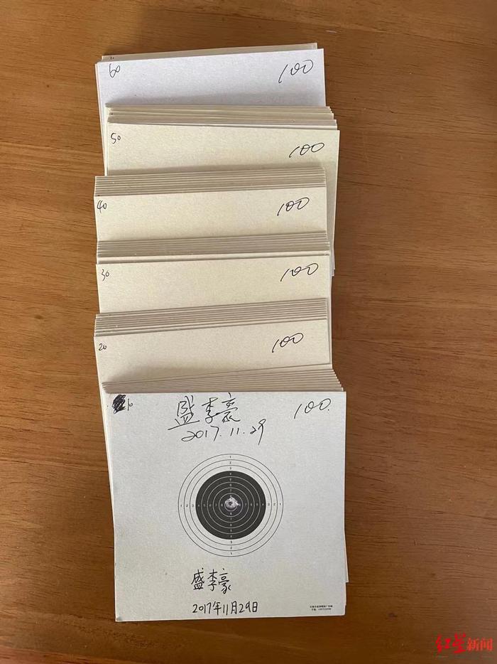 沈超手机里还保存着当时盛李豪打出600环满分的靶纸的图片
