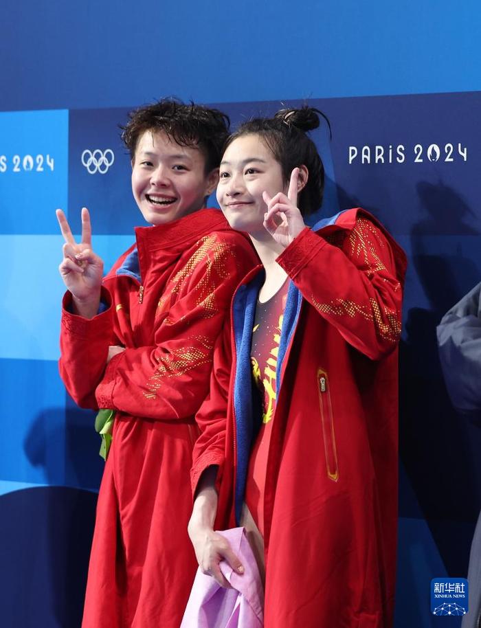   7月27日，中国选手昌雅妮（右）/陈艺文在比赛中。新华社记者 李颖 摄